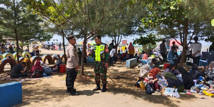 Kabid Humas Polda Jabar : Polisi Melakukan Pengamanan Di Objek Wisata Pantai Bali Dan Tirta Ayu*