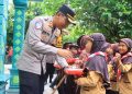 Kapolres Ngawi Berbagi Makan Gizi dan Susu Gratis di Sekolah Dasar Pelosok Desa