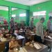 POLRES NGANJUK BAGIKAN MAKAN SIANG BERGIZI GRATIS DI SDN 1 WILANGAN