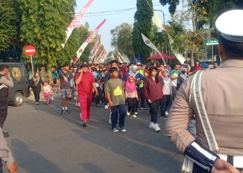 Polres Ngawi Amankan Jalan Sehat Peringatan Hari Jadi Koperasi Ke 79