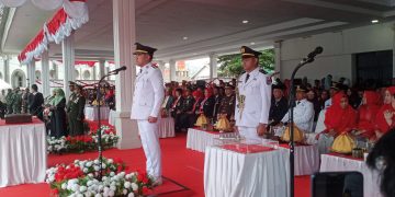 Bupati Jeneponto Pimpin Upacara Pengibaran Bendera Merah Putih HUT RI ke-80 Dilapangan Passamaturukang