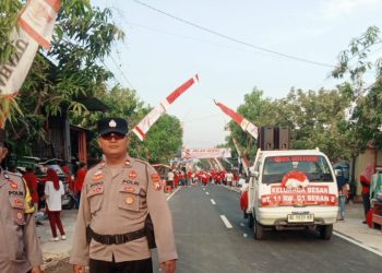 Polsek Ngawi Kota Amankan Jalan Sehat dalam Meriahkan HUT RI Ke 80