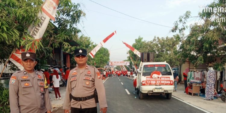 Polsek Ngawi Kota Amankan Jalan Sehat dalam Meriahkan HUT RI Ke 80